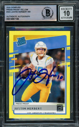 Justin Herbert Autographed 2020 Panini Donruss Rated Rookie Yellow Rookie Card #303 Los Angeles Chargers Auto Grade Gem Mint 10 Beckett BAS #14867186