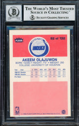 Hakeem Olajuwon Autographed 1986-87 Fleer Rookie Card #82 Houston Rockets Auto Grade Gem Mint 10 "The Dream" Beckett BAS #14127419