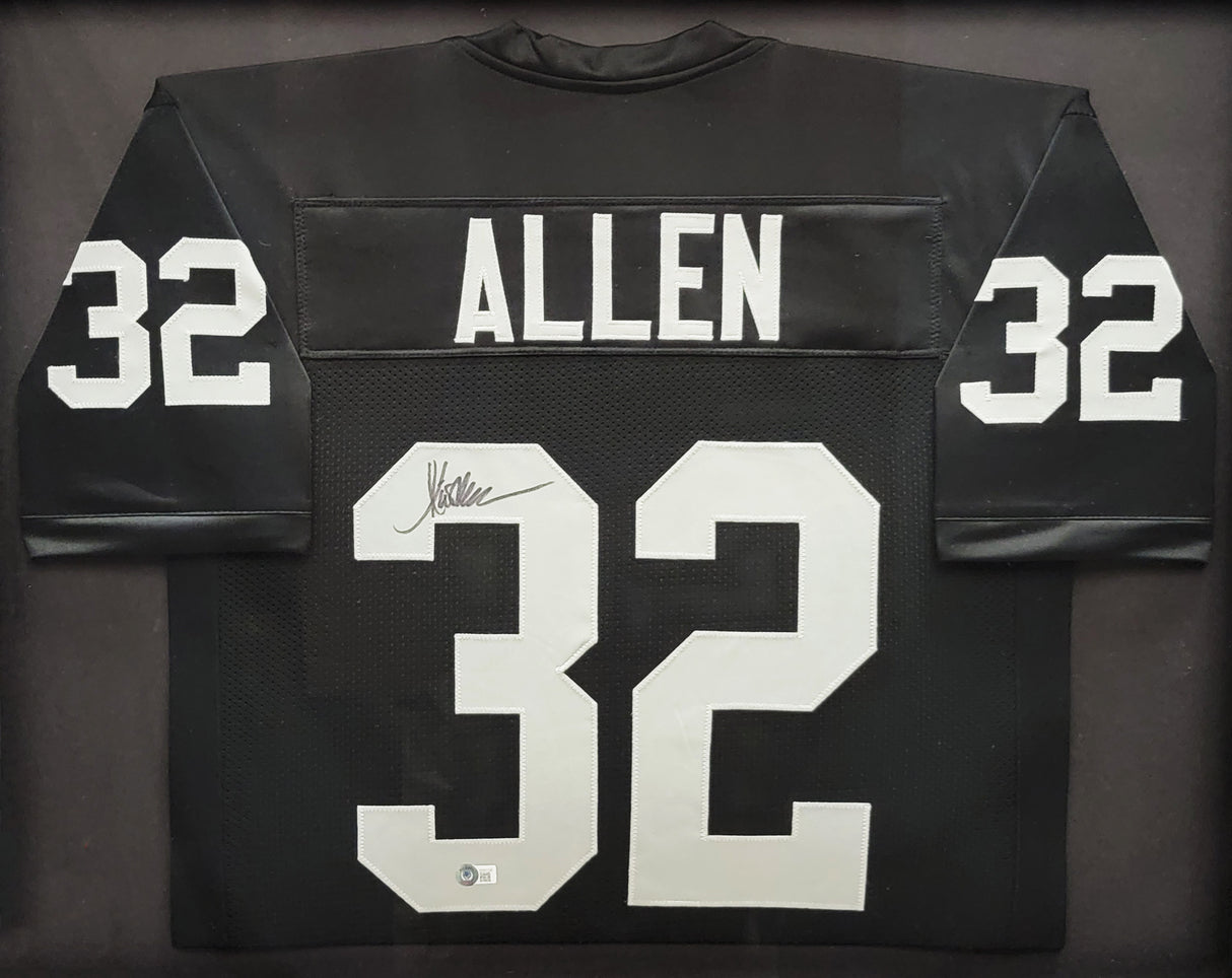 Oakland Raiders Marcus Allen Autographed Framed Black Jersey Beckett BAS Witness Stock #210139
