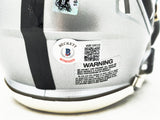 Josh Jacobs Autographed Las Vegas Raiders Silver Speed Mini Helmet Beckett BAS QR #WR38830