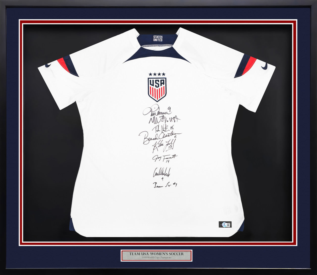 Team USA 1999 Women's World Cup Champions Autographed Framed White Nike Jersey With 8 Signatures Including Hamm & Chastain Beckett BAS Witness Stock #249470