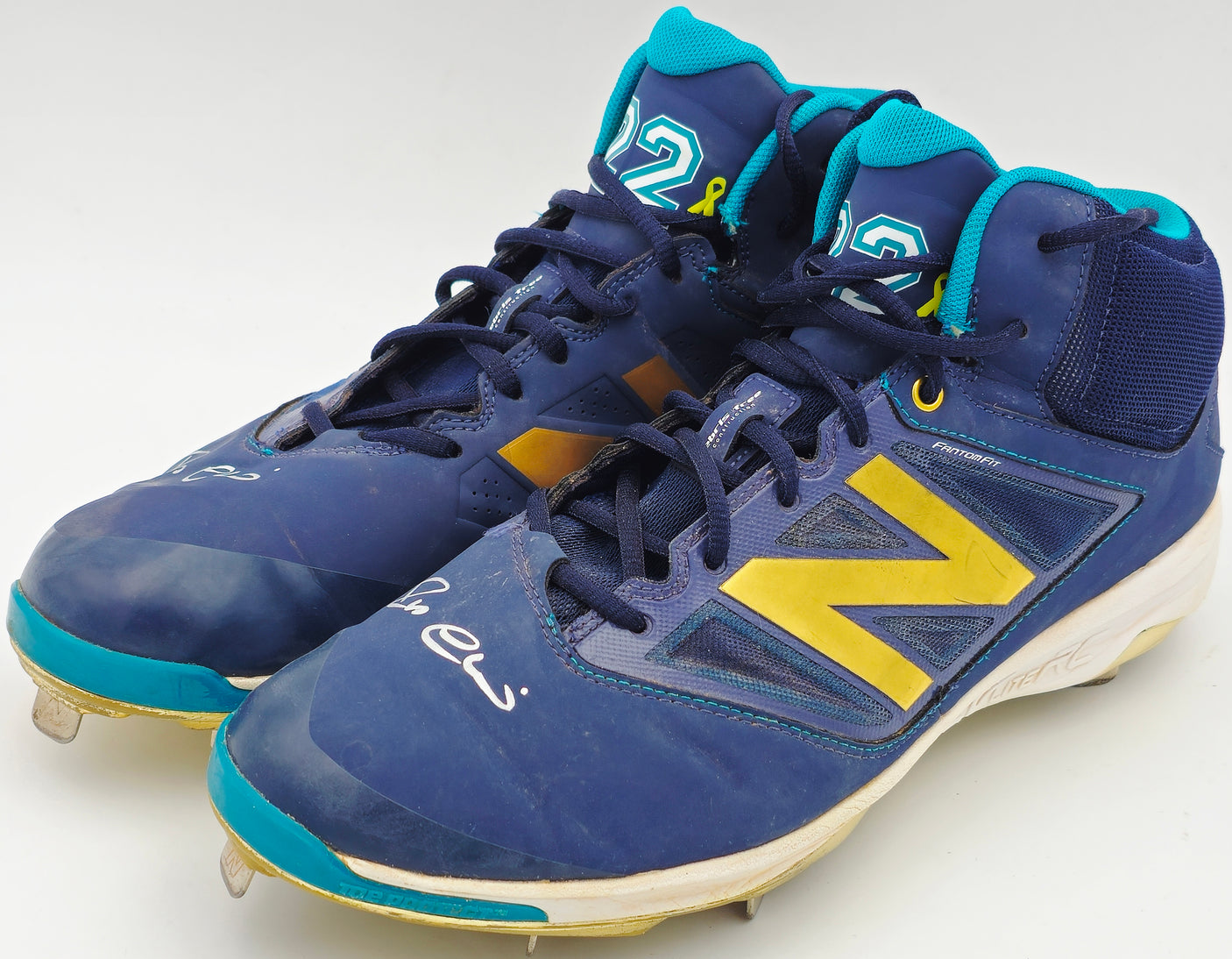 Robinson Cano Autographed Pair of Game Used Blue, Gold & Teal New Balance Revlite Cleats Seattle Mariners PSA/DNA #7A96537 & 7A96538