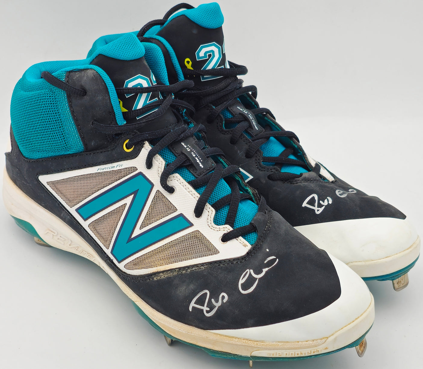 Robinson Cano Autographed Pair of Game Used Teal, White & Black New Balance Revlite Cleats Seattle Mariners PSA/DNA #7A96599 & 7A96600