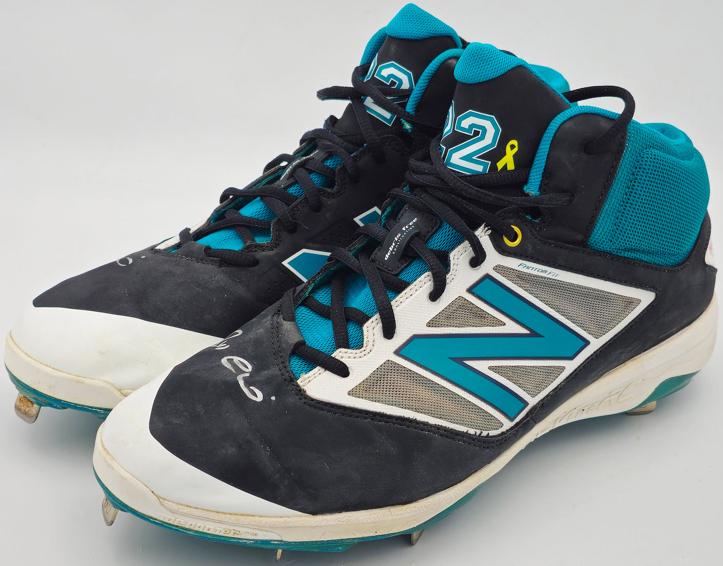 Robinson Cano Autographed Pair of Game Used Teal, White & Black New Balance Revlite Cleats Seattle Mariners PSA/DNA #7A96599 & 7A96600