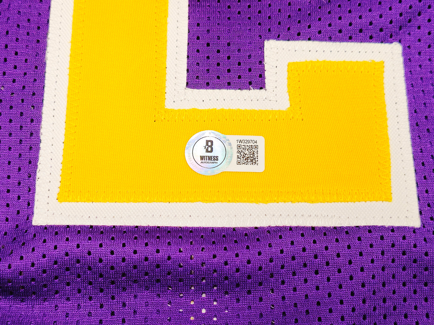 Utah Jazz John Stockton Autographed Purple Jersey Beckett BAS Witness Stock #224360