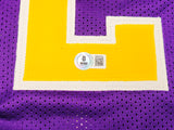 Utah Jazz John Stockton Autographed Purple Jersey Beckett BAS Witness Stock #224360