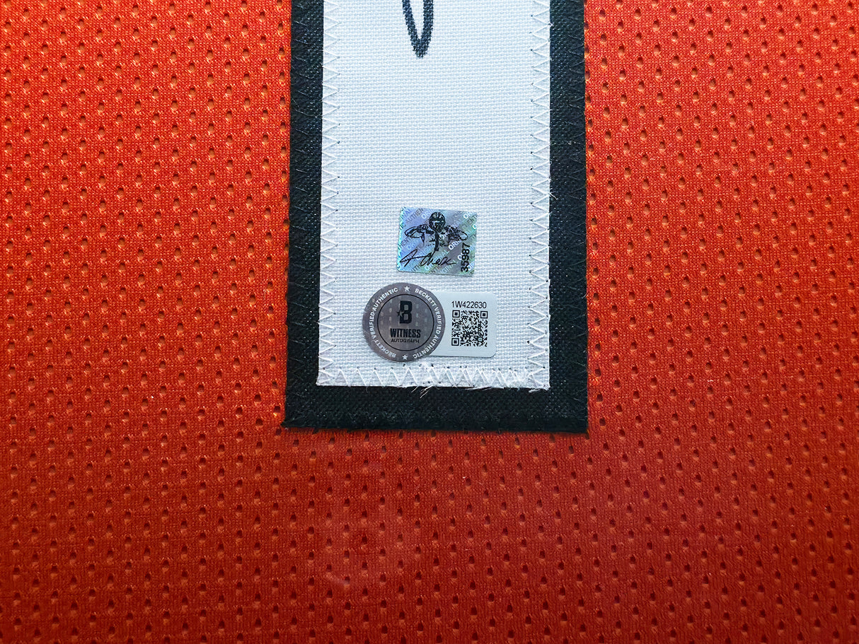 Cincinnati Bengals Ja'Marr Chase Autographed Framed Orange Jersey Beckett BAS Witness Stock #239062