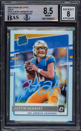 Justin Herbert Autographed 2020 Donruss Optic Holo Rookie Card #153 Los Angeles Chargers BGS 8.5 Auto Grade Near Mint/Mint 8 Beckett BAS #15469227