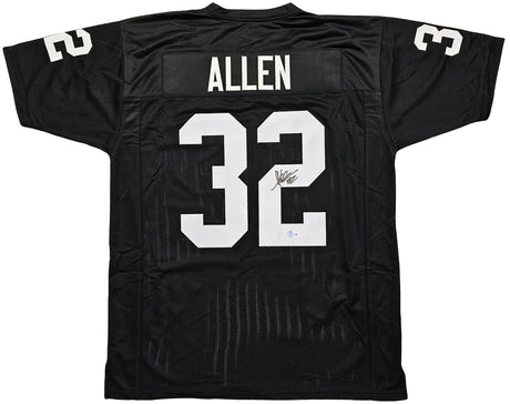 Oakland Raiders Marcus Allen Autographed Black Jersey Beckett BAS Witness Stock #215325