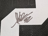 Oakland Raiders Marcus Allen Autographed Black Jersey Beckett BAS Witness Stock #215325