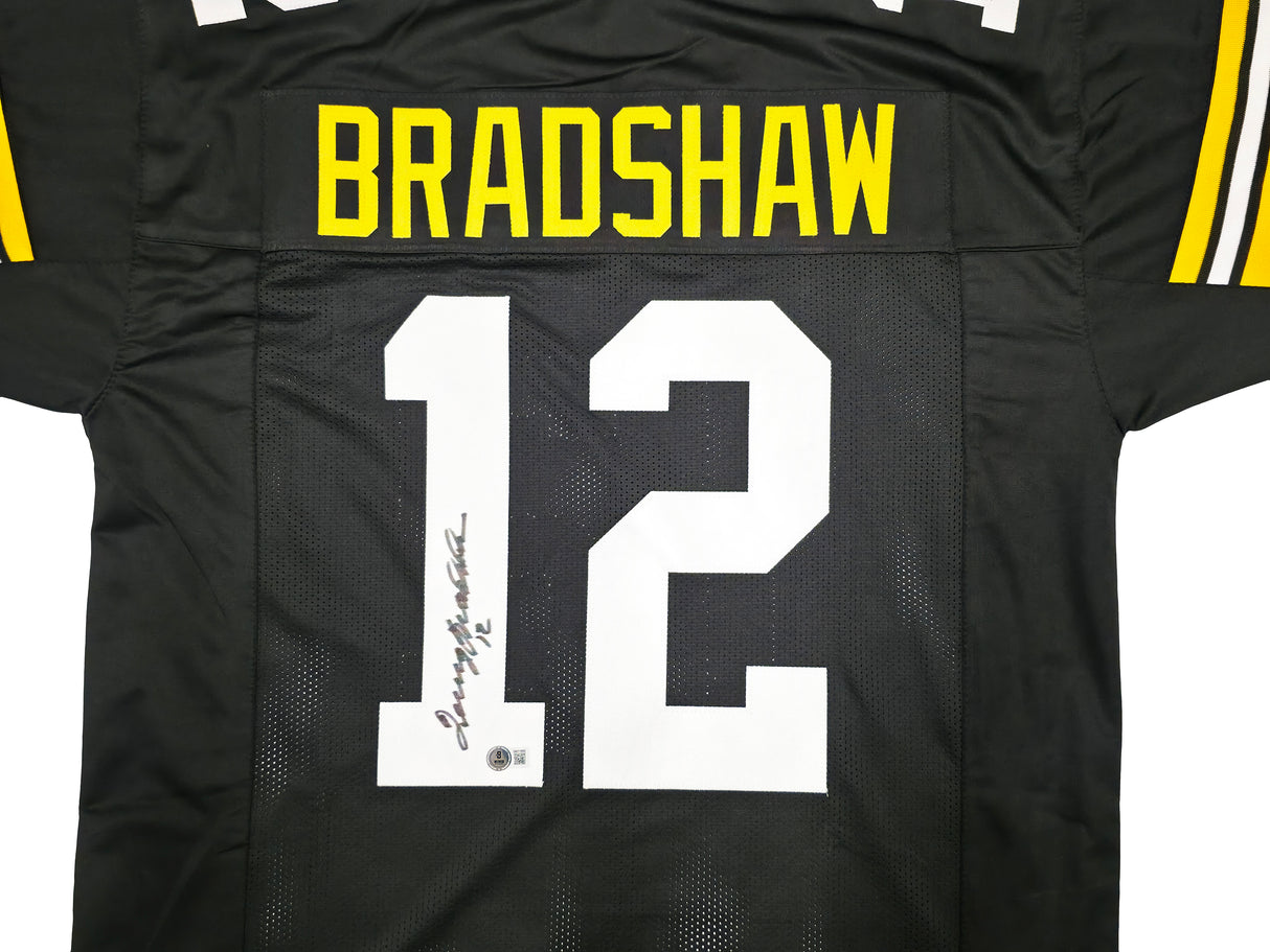 Pittsburgh Steelers Terry Bradshaw Autographed Black Jersey Beckett BAS Witness Stock #239865