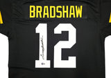 Pittsburgh Steelers Terry Bradshaw Autographed Black Jersey Beckett BAS Witness Stock #239866