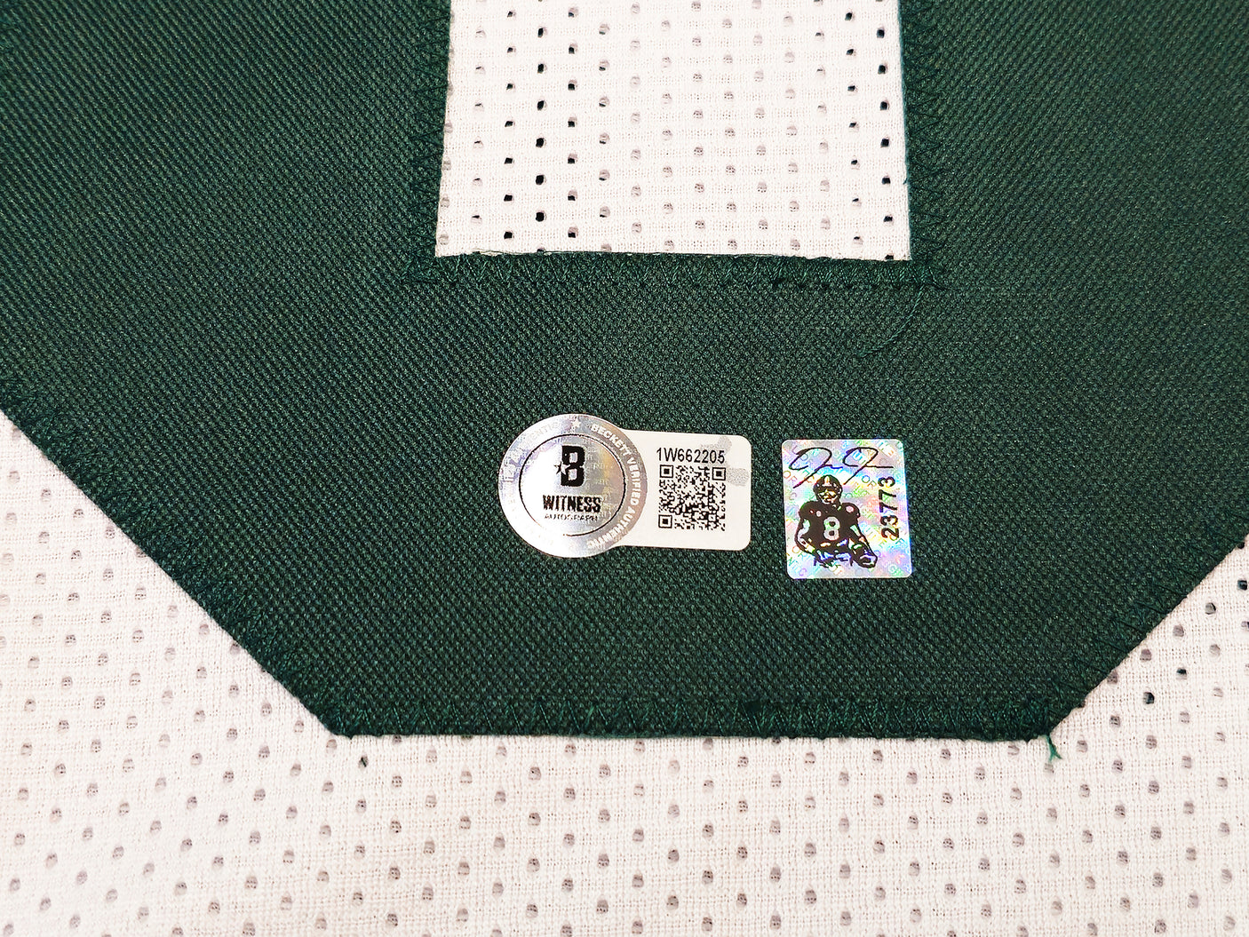 Green Bay Packers Josh Jacobs Autographed White Jersey Beckett BAS Witness Stock #229522