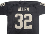 Oakland Raiders Marcus Allen Autographed Black Jersey Beckett BAS Witness Stock #230004