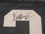 Oakland Raiders Marcus Allen Autographed Black Jersey Beckett BAS Witness Stock #230004