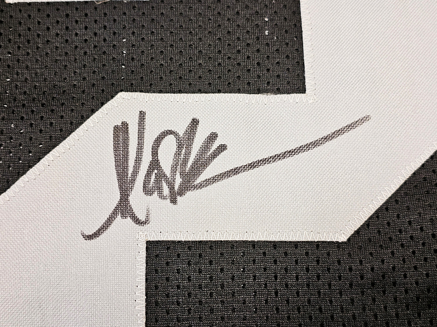 Los Angeles Raiders Marcus Allen Autographed Black Jersey "HOF 03" Beckett BAS Witness Stock #215672