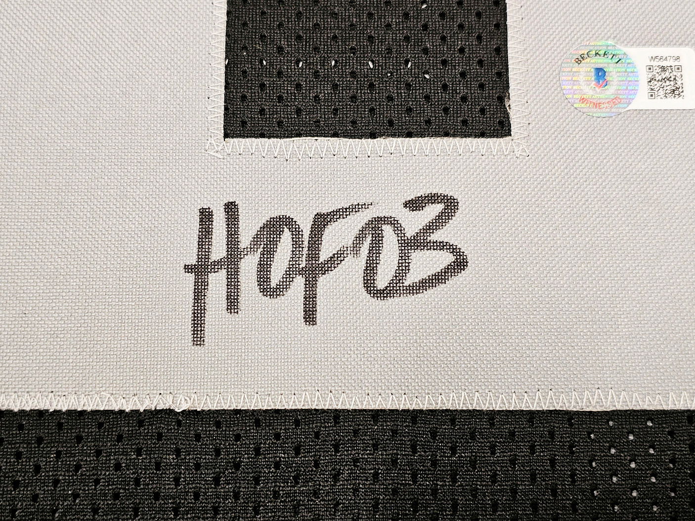 Los Angeles Raiders Marcus Allen Autographed Black Jersey "HOF 03" Beckett BAS Witness Stock #215672