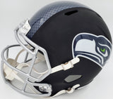 Russell Wilson Autographed Seattle Seahawks Matte Black Speed Full Size Replica Helmet In Green RW Holo Stock #145844