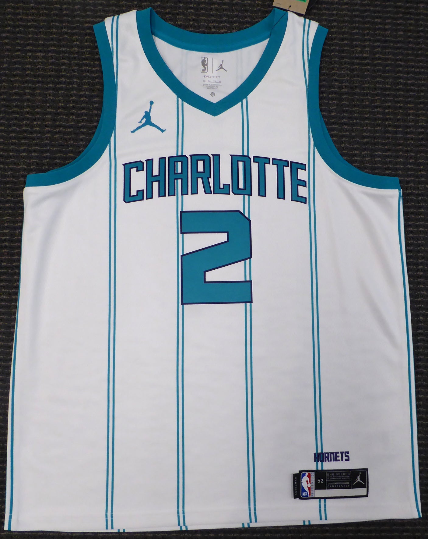 Charlotte Hornets Lonzo Ball Autographed White Nike Swingman Jersey Size 52 Beckett BAS QR #AB89467