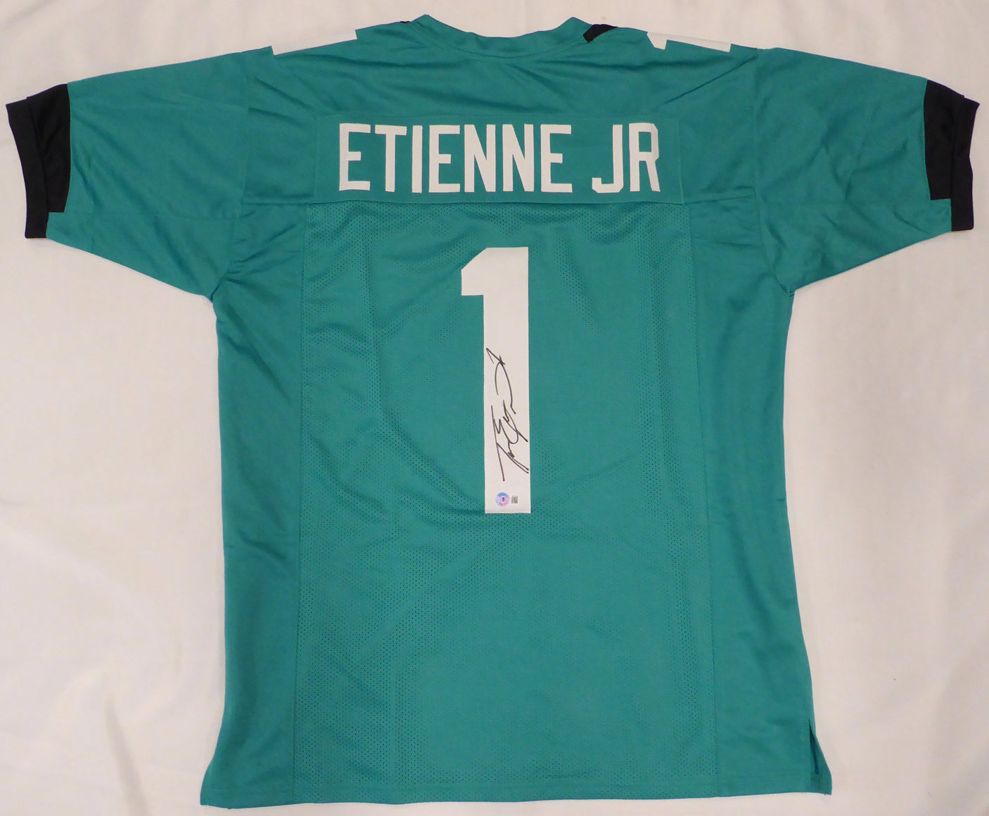 Jacksonville Jaguars Travis Etienne Autographed Teal Jersey Beckett BAS QR #W713279