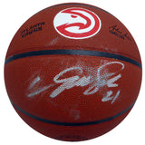Dominique Wilkins Autographed Atlanta Hawks Logo Basketball (Smudged) Beckett BAS QR #WW44508