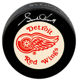 Gordie Howe Signed Red Wings Large Logo With White Background Hockey Puck (In Silver) - (JSA COA)