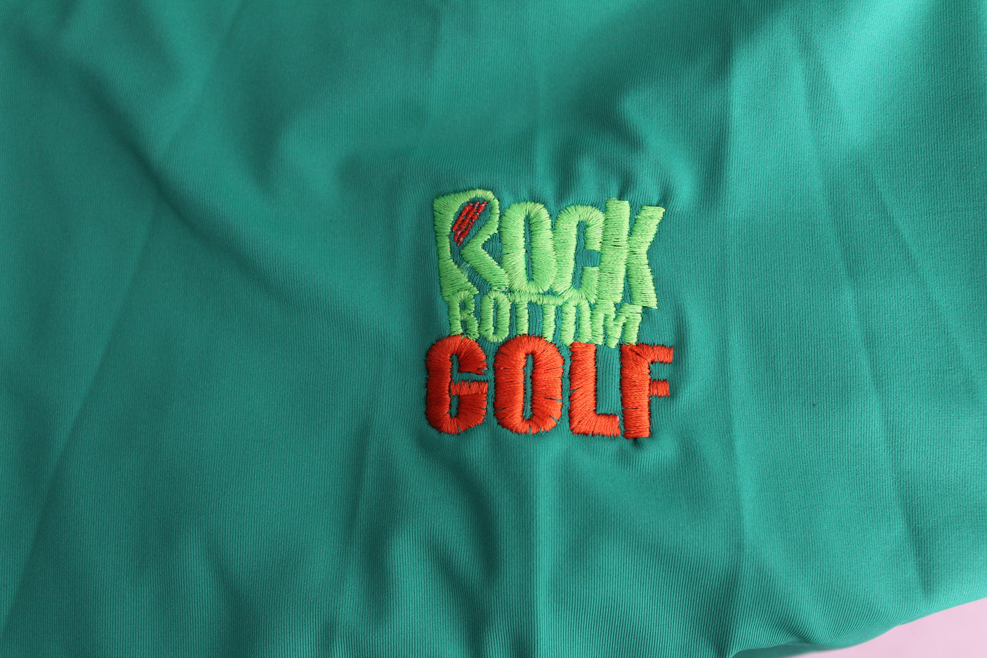 John Daly Signed Match Worn Green Folds of Honor Quarter Zip Shirt BAS #BH00322