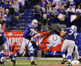 Peyton Manning Signed Indianapolis Colts Blue Jersey Passing Action 8x10 Photo- (JSA)