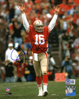 Joe Montana Signed San Francisco 49ers Arms Raised Red Jersey 8x10 Photo (Beckett)