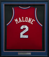 Philadelphia 76ers Moses Malone Autographed Framed Red Jersey "HOF 2001" Beckett BAS QR #BS30061