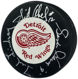 Gordie Howe, Sid Abel, & Ted Lindsay Autographed Official Detroit Red Wings Logo Hockey Puck Production Line Beckett BAS #AE85128