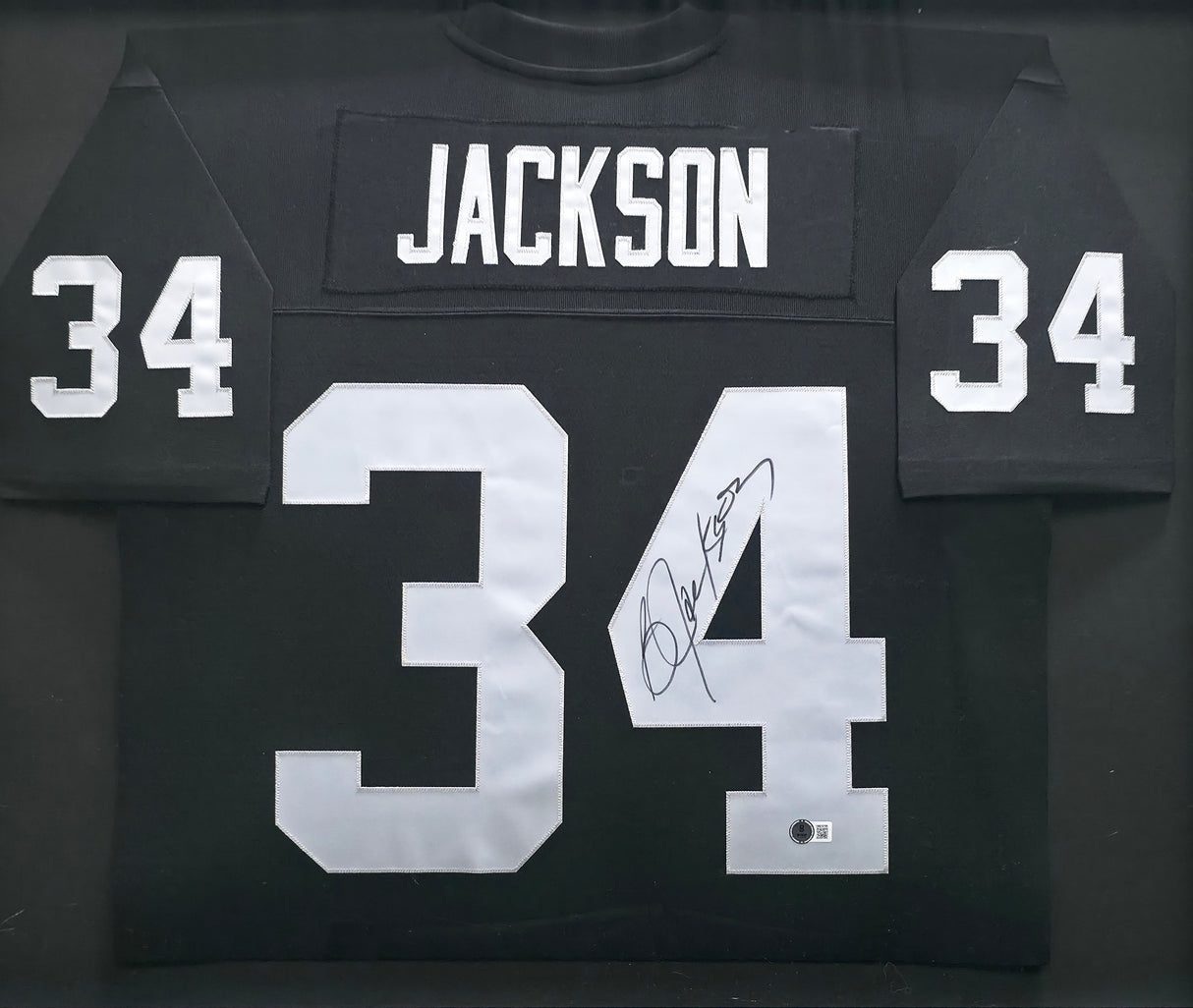 Oakland Raiders Bo Jackson Autographed Framed Black Jersey (Dent) Beckett BAS Witness #1W615199