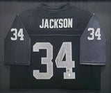 Oakland Raiders Bo Jackson Autographed Framed Black Mitchell & Ness 1987 Throwback Jersey Beckett BAS QR #BU86725