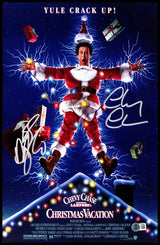 Chevy Chase & Beverly D'Angelo Autographed 11x17 Poster National Lampoon's Christmas Vacation (Smudged) Beckett BAS Witness #2W236447