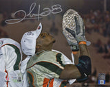 Clinton Portis Signed Miami Hurricanes Kissing Football 8x10 Photo - (Fanatics)