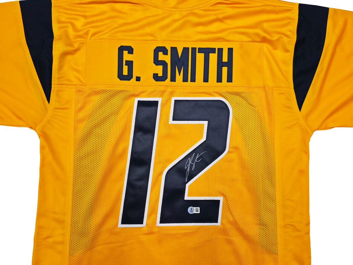 West Virginia Mountaineer Geno Smith Autographed Gold Jersey Beckett BAS Witness Stock #254166