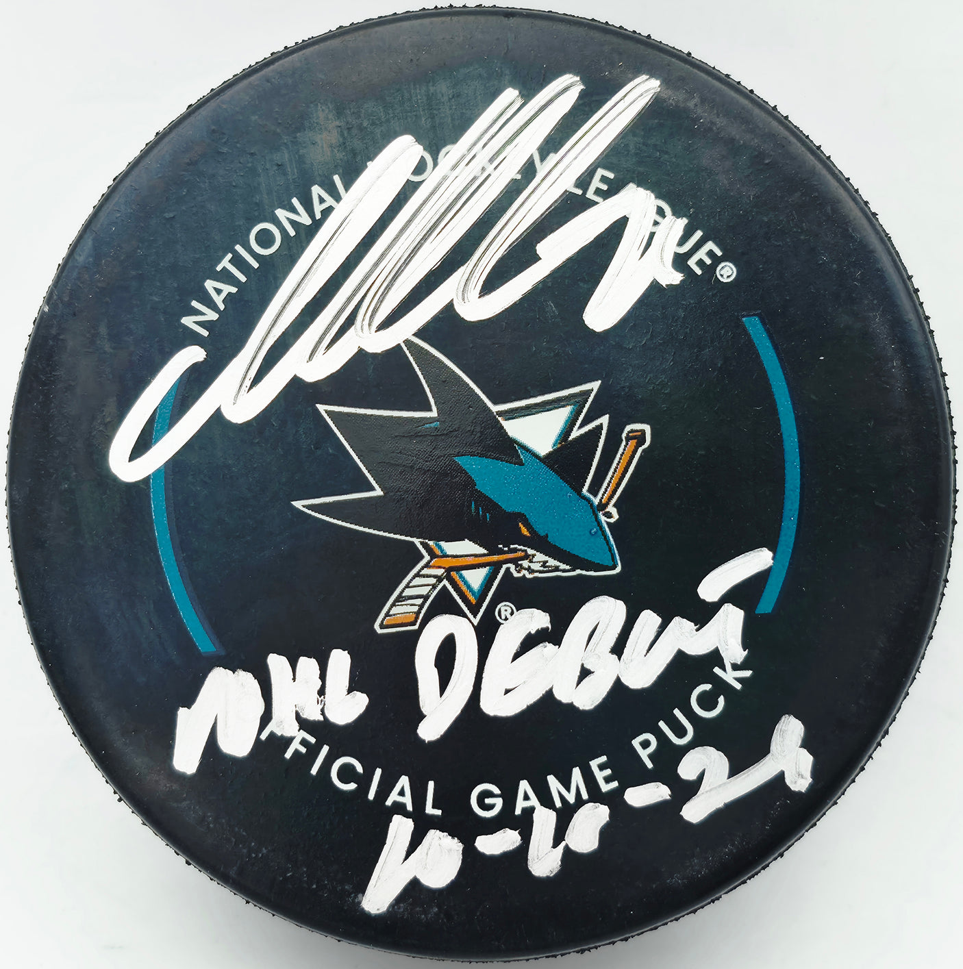 Macklin Celebrini Autographed Official San Jose Sharks Logo Game Hockey Puck "NHL Debut 10-10-24" Fanatics Holo Stock #256806