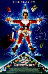 Chevy Chase Autographed 11x17 Movie Poster Christmas Vacation Clark Griswold (In White) Beckett BAS QR Stock #261967