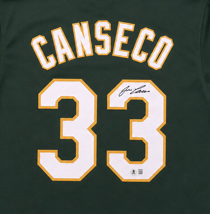 Oakland A's Jose Canseco Autographed Green Jersey Beckett BAS Witness Stock #267074