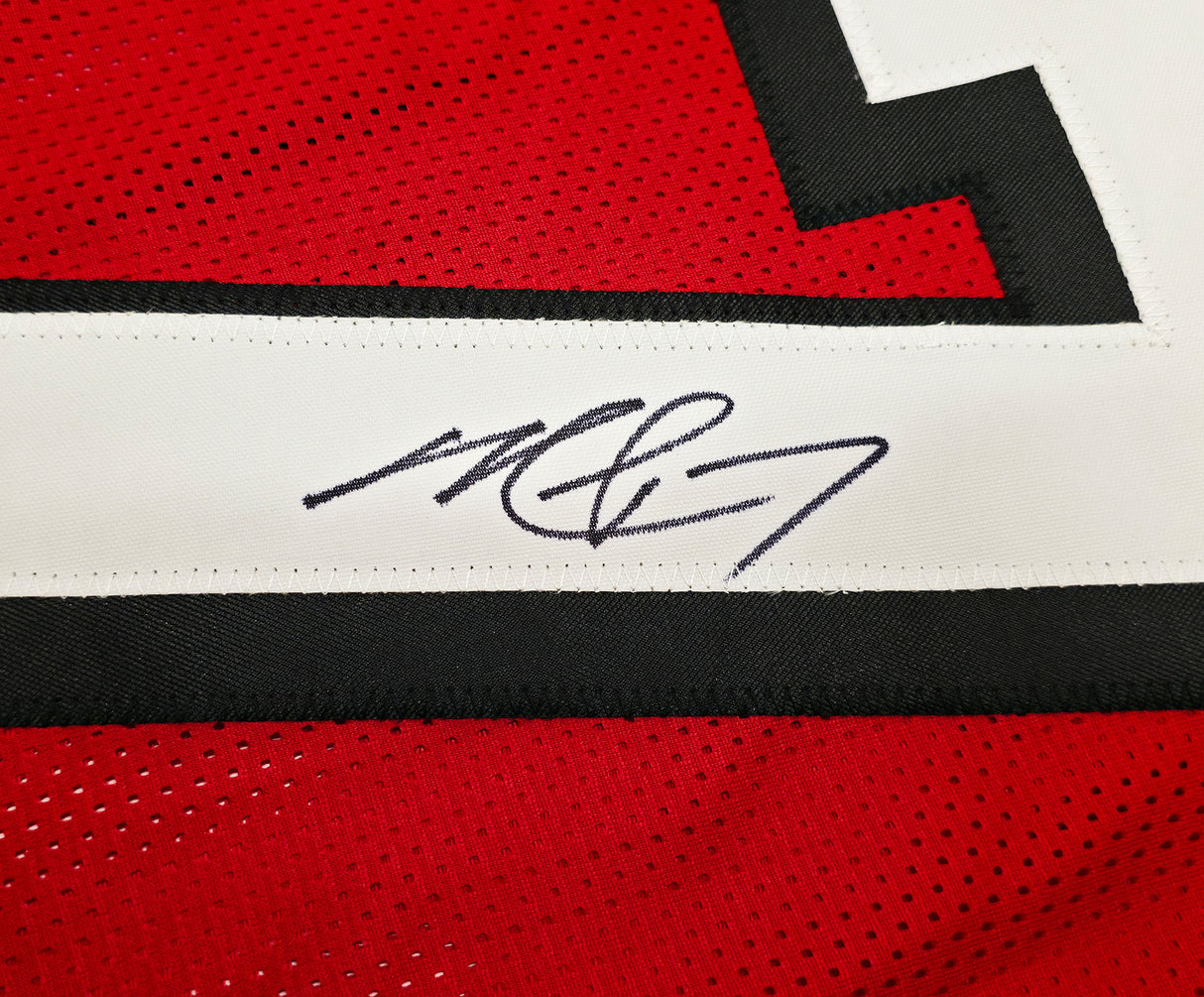 Atlanta Falcons Michael Vick Autographed Red Jersey Beckett BAS Witness Stock #267501