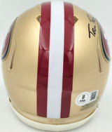 Tom Rathman Autographed San Francisco 49ers Gold Speed Mini Helmet Beckett BAS Witness Stock #253315
