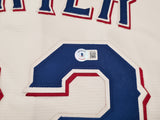 Texas Rangers Evan Carter Autographed White Nike Jersey Size M "23 WS Champs" Beckett BAS Witness Stock #252436