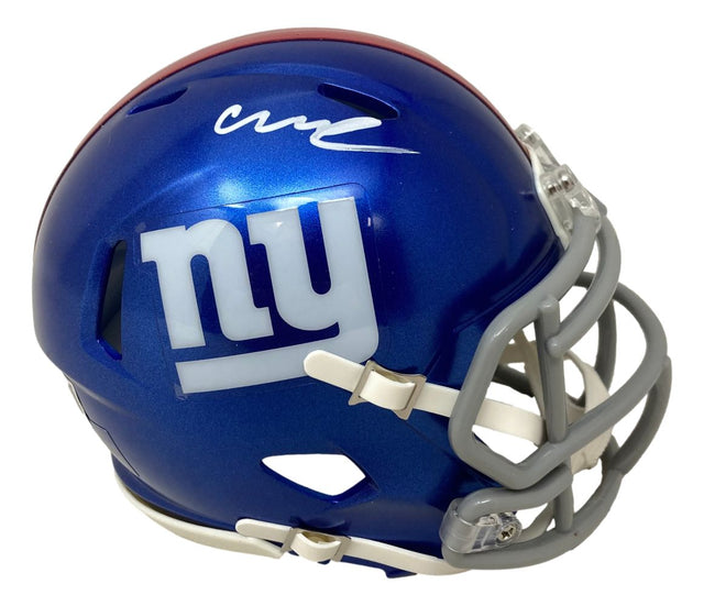The Sports Integrity Abdul Carter Signed New York Giants Mini Speed Helmet features a blue shell, white facemask, "ny" logo on the side, and Abdul Carter's signature on top.
