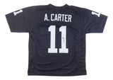 A navy blue Abdul Carter Penn State football jersey by Sports Integrity features white lettering, A. Carter above large number 11 on the back and sleeves, plus a JSA-certified signature below the number.