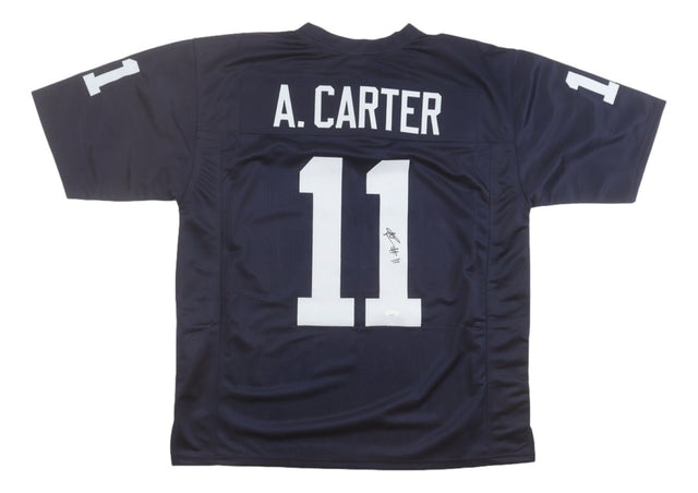 A navy blue Abdul Carter Penn State football jersey by Sports Integrity features white lettering, A. Carter above large number 11 on the back and sleeves, plus a JSA-certified signature below the number.