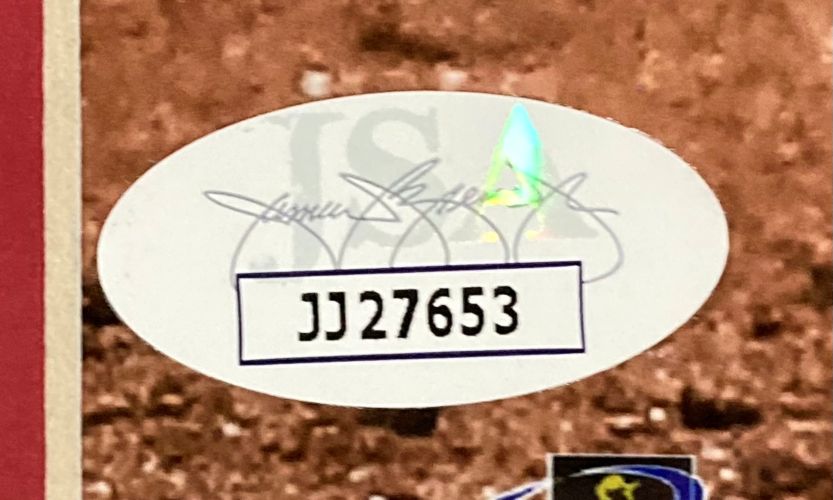 A Sports Integrity holographic oval sticker with code JJ27653 and signature is on the framed 16x20 Ronald Acuna Jr. Atlanta Braves photo (JSA authenticated).