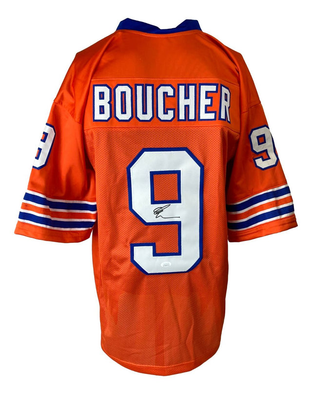 The Sports Integrity Adam Sandler The Waterboy Signed Custom Boucher Football Jersey features orange fabric, blue and white striped sleeves, "BOUCHER" above an autographed number 9 on the back, and number 9 on both sleeves. JSA CC93934 authenticated.
