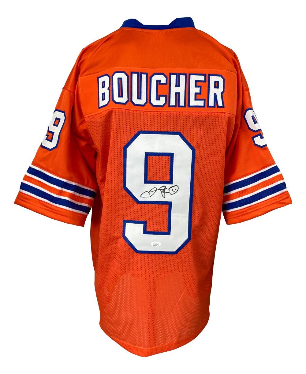 The Sports Integrity Adam Sandler The Waterboy Signed Custom Boucher Football Jersey JSA is an orange jersey with blue and white trim, featuring "BOUCHER" and the number 9 on the back signed in black marker.