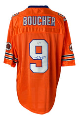 The Sports Integrity Adam Sandler Signed The Waterboy Bobby Boucher Jersey (BAS BF15068) features an orange design with blue/white trim, #9 signed in blue ink, "BOUCHER" on the back, and a waterboy logo on the sleeves.