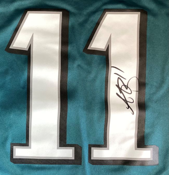 The AJ Brown Signed Philadelphia Eagles Super Bowl 59 Nike Game Jersey by Sports Integrity features a teal design with a large white and black-outlined number 11, plus a black autograph on the right side of the number.